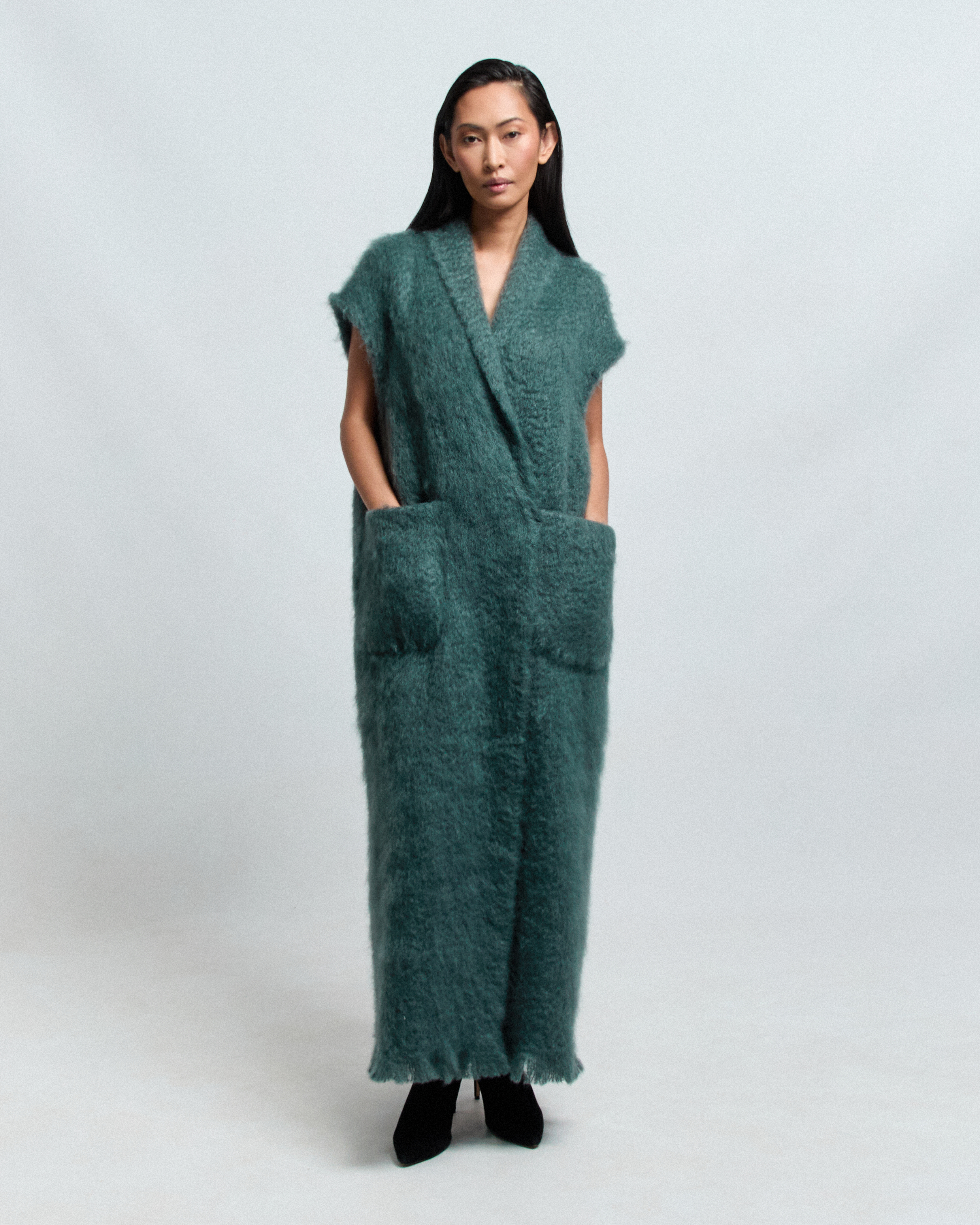 · MARA long mohair vest with shawl collar and kimono sleeve — Pohjanheimo · MARA vest front view showing oversized patch pockets — Pohjanheimo atelier · MARA mohair vest layered look — Pohjanheimo Tallinn